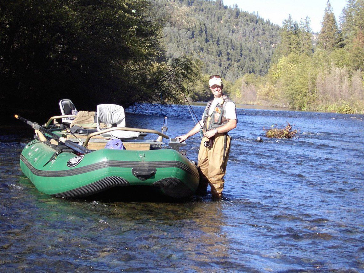 https://www.flyfishingtraditions.com/wp-content/uploads/2015/09/Blake_tending_the_raft-1184x888.jpg